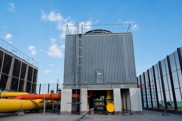Cooling tower and pipe for air condition System (HVAC) in Factory. Cooling tower for air...