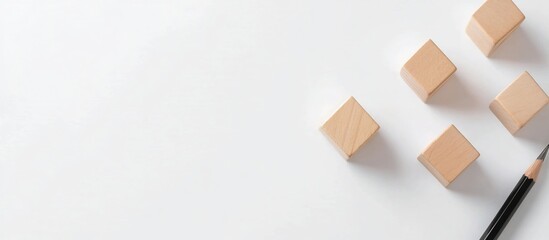 Wooden blocks and pencil on white background.
