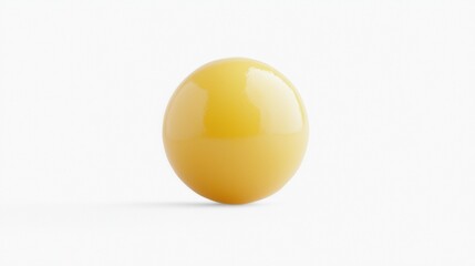Bright yellow spherical object resting on a white surface with soft shadows, creating a modern aesthetic