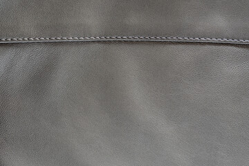 Taupe gray color lambskin leather texture with seam