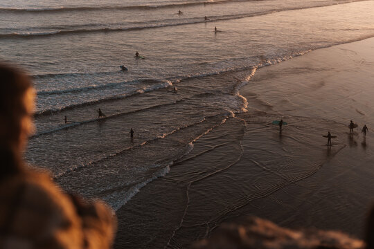 Summer surfing holiday scene, sunset beach view