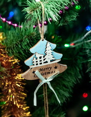 Christmas toys on an artificial Christmas tree close-up