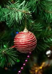 Christmas toys on an artificial Christmas tree close-up