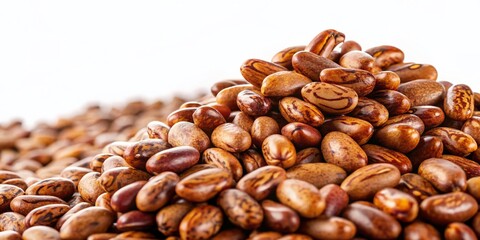 Fototapeta premium Dried Brown Beans Heap, Close-Up, Isolated on White Background - High-Resolution Stock Photo