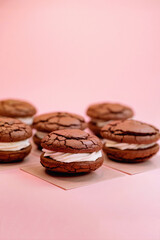 Freshly baked Chunky Cookies with Cream Cheese isolated on a pink background