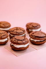 Freshly baked Chunky Cookies with Cream Cheese isolated on a pink background