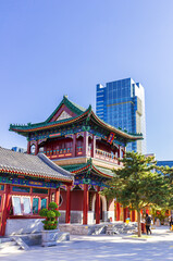 Historic temple of the Dabei Monastery and modern buildings in Tianjin, China
