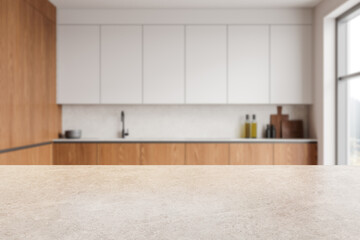 Neutral countertop in modern kitchen with wooden cabinets, blurred background. 3D Rendering