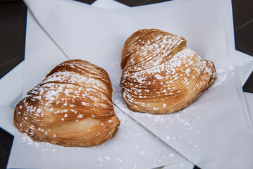 Sfogliatella Neapolitan pastrys. Sfogliatella is a shell-shaped filled Italian pastry native to Campania.