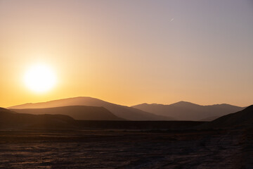 Beautiful yellow sunset in the mountains. Azerbaijan.