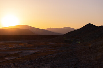 Beautiful yellow sunset in the mountains. Azerbaijan.