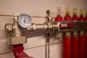 Pressure Gauge and Fire Safety Equipment Used in an Industrial Setting for Optimal Monitoring