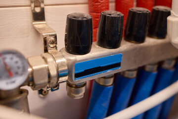 Pressure Gauge and Fire Safety Equipment Used in an Industrial Setting for Optimal Monitoring
