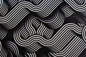 Abstract black and white pattern with wavy lines creating a dynamic, optical illusion effect. Perfect for backgrounds, textiles, or modern graphic designs.