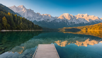 Alpine lake and mountain reflection