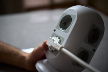 Introducing a modern power strip with multiple outlets for efficient charging and convenience