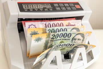 Hungary money, Financial concept. Hungarian forint exchange rate. Banknotes in a counting machine, close up