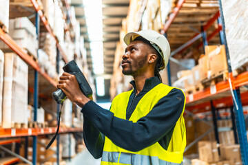 African man using a wireless scan to do inventory