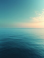 Fototapeta premium Calm ocean reflecting beautiful sunset colors during twilight