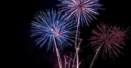 Fireworks, Holiday fireworks above water with reflection on the black sky background