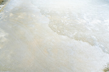 Flower of salt or Fleur de Sel Floating on Water Surface in a Salt Field