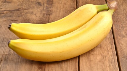Freshly Harvested Bananas Displayed on a Rustic Wooden Table, Showcasing Their Bright Yellow Color and Smooth Texture, Perfect for Healthy Lifestyle Imagery