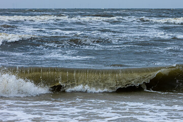 Fototapeta premium Waves of the north sea with white spindrift