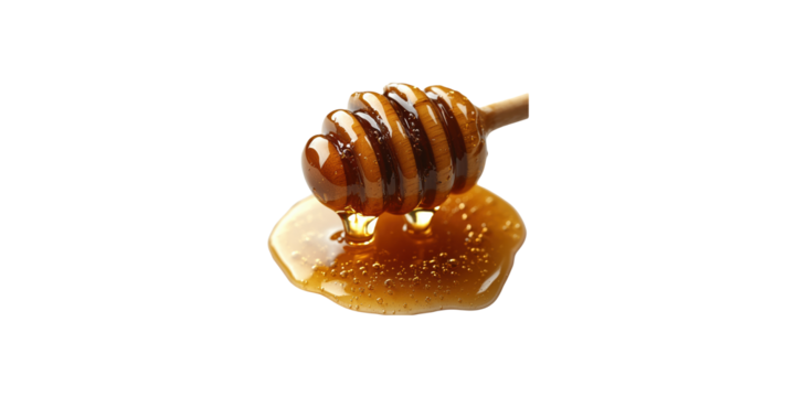 Honey dripping from wooden honey dipper isolated on transparent background