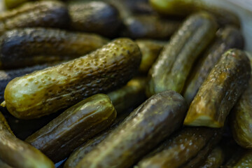 Pickled cucumbers in a barrel at the market. Fermented products. Eco-friendly products