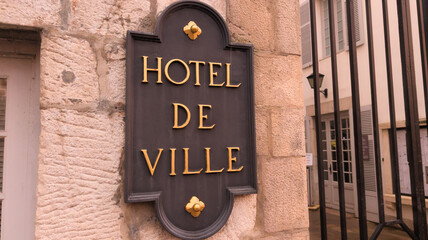 hotel de ville text sign in building facade means in french city hall mayor signage on stoned...