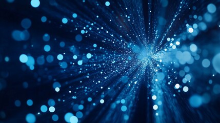 Abstract blue light particles radiating outward, creating a sense of depth and motion.