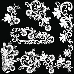 six white decorations set on black background