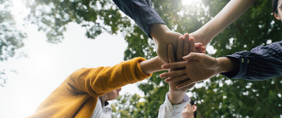 ESG,empathy,partnership and Social connection.Business people join hands together for CSR,corporate social responsibility.World environment day.Global community teamwork.Charity,volunteer, partnership