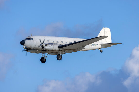 Luqa, Malta - January 11, 2025: National Test Pilot School Douglas DC-3-65TP (REG: N882TP) on finals runway 31. Built in 1945, this airframe is 80 years old.
