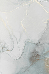 Elegant alcohol ink abstract design featuring soft hues and delicate gold accents