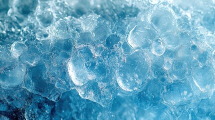Obraz premium Close-up of textured blue ice with air bubbles.