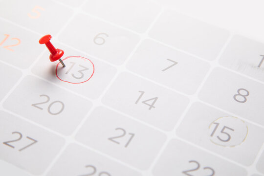 Push pin on a calendar. Planning. Business - Powered by Adobe