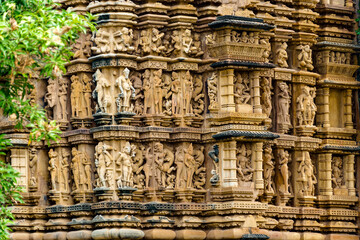 India. Madhya Pradesh state. The Khajuraho Group of Monuments are a group of Hindu and Jain temples. Bas relief at Parshvanatha Jain temple