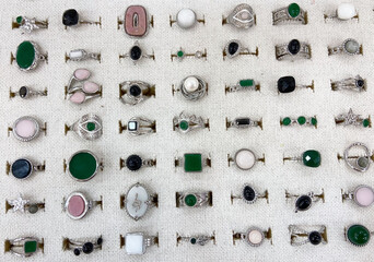 Silver rings showcase in jewellery store close up.Selective focus.