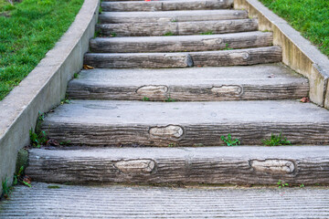 Unique wood-patterned steps in a park create an inviting atmosphere