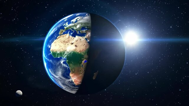 The Earth in space, half illuminated by the sun.