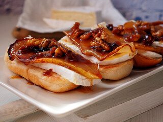 Bruschetta with Creamy Camembert Cheese, Caramelized Pear, and Toasted Walnuts on Artisan Bread