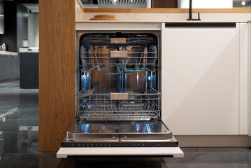 Modern open dishwasher with sleek design and spacious interior, front view