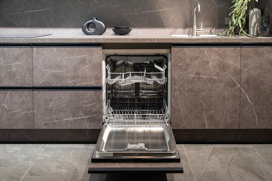 Built-in empty dishwasher featuring multiple wash cycles and ergonomic design