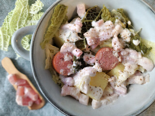 Steamed Savoy Cabbage with Potatoes, Sliced Smoked Sausage and a Creamy Bacon Sauce