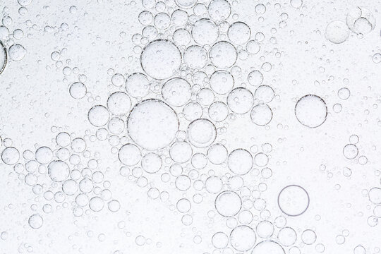 Soda bubbles close up macro,Macro bubbles,Close up macro Aloe vera gel serum cosmetic texture blue background with bubbles. Cruelty free. Lemongrass gel skincare product. antibacterial liquid