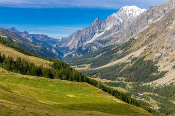 Val Ferret mountain landscape in the Alps. Beautiful alpine scenery of the high mountain summits...