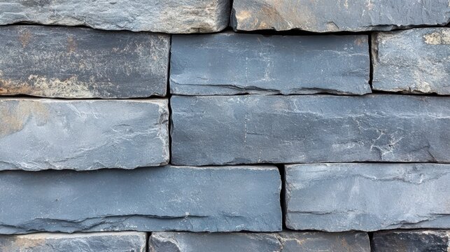 Captivating bluestone texture in muted gray-blue tones reveals nature's rugged beauty and subtle elegance