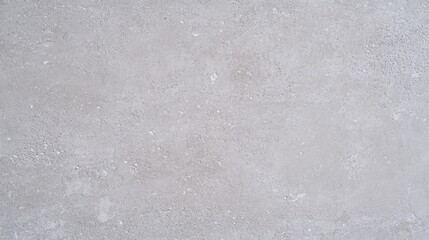 Obraz premium Smooth gray wall texture offers a canvas of subtle imperfections and natural beauty in a serene, minimalist setting