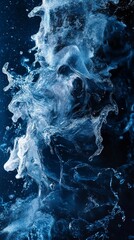 Obraz premium A captivating image captures the beauty of clear water splashing against a deep blue backdrop, showcasing the vibrant energy and motion of wave crests and droplets in fluid harmony